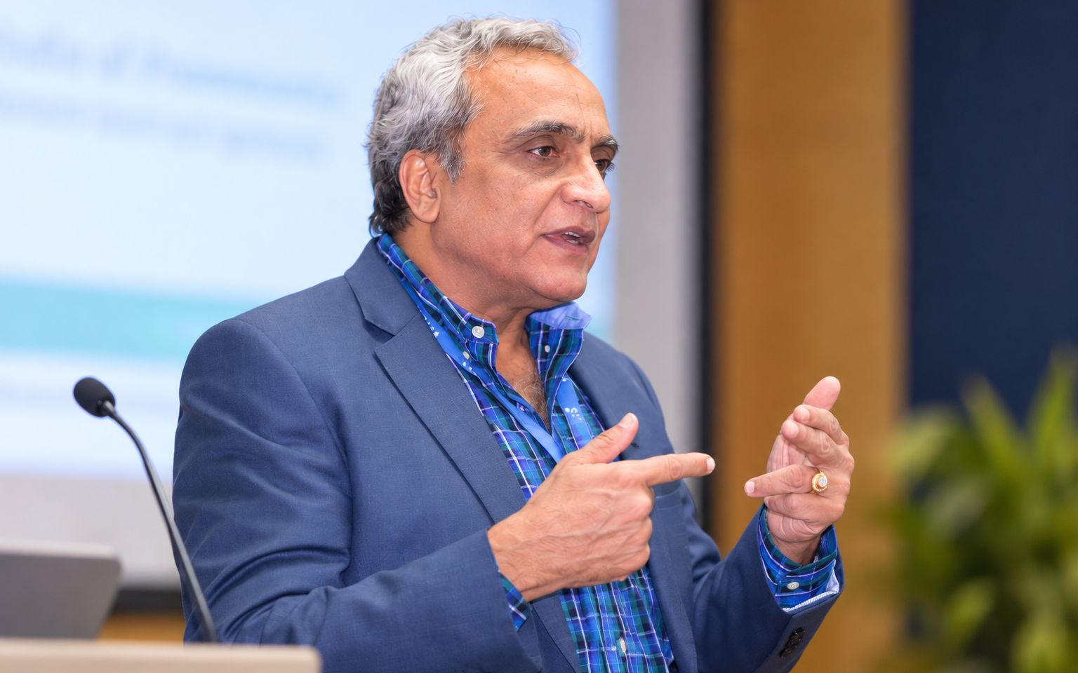 Dr. Nimesh G. Desai speaking at a conference
